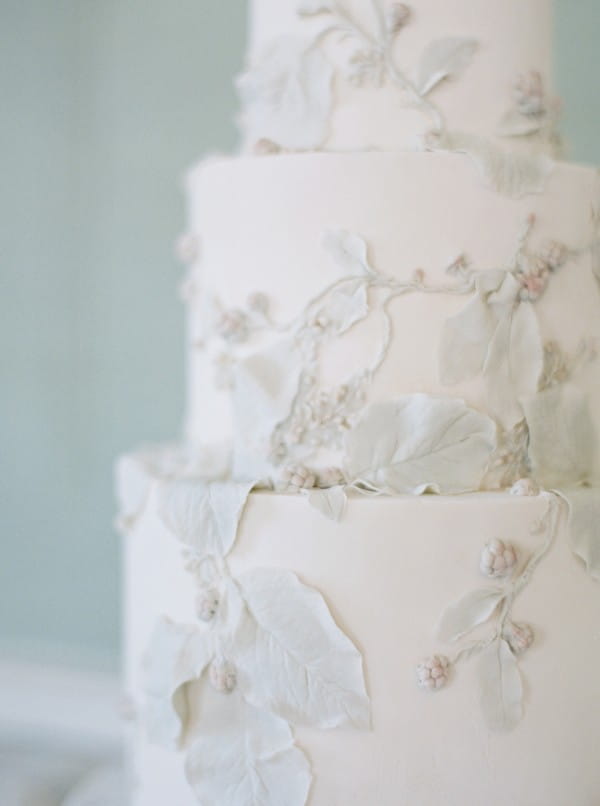 Leaf detail on white wedding cake