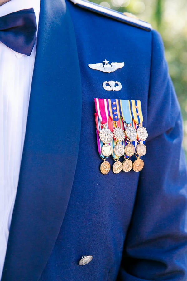 Medals on groom's military uniform