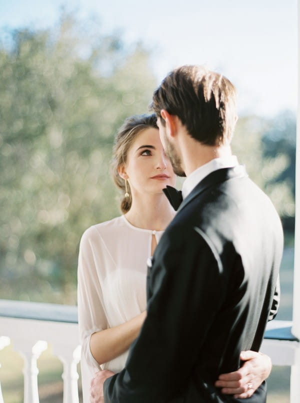 Bride staring into groom's eyes