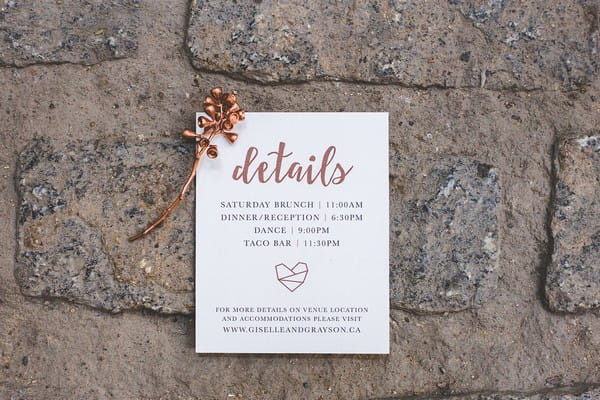 Wedding details card with copper writing