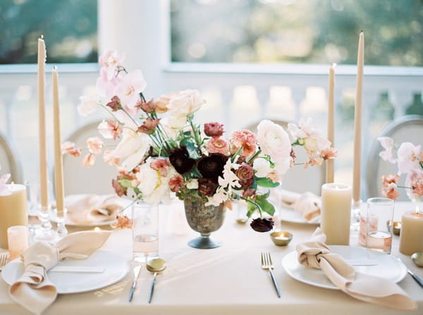 Blush and dark pink wedding table flowers