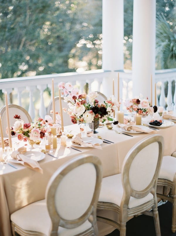 Wedding table with candles and floral displays