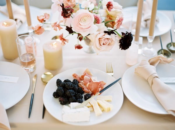 Wedding plate with blackberries, meats and cheese