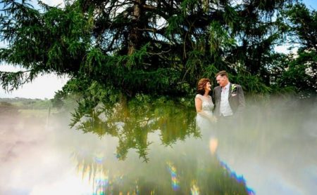 Distorted picture of bride and groomin front of tree - Picture by Lisa Carpenter Photography