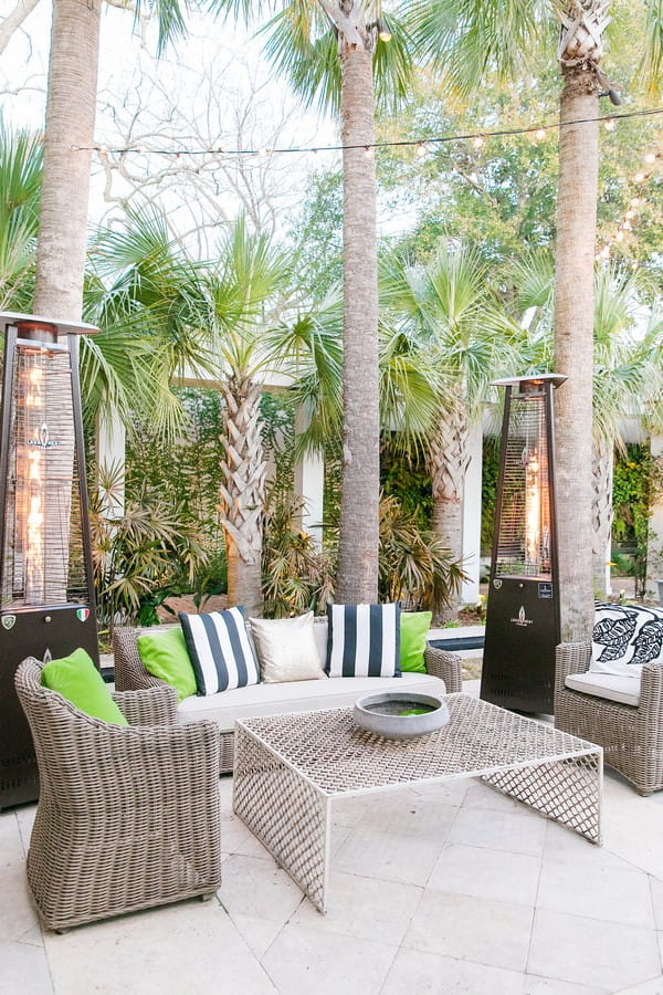 Wedding chill out area with Kate Spade striped cushions