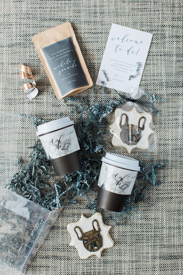 Coffee cups with personalised sleeves and dog biscuits