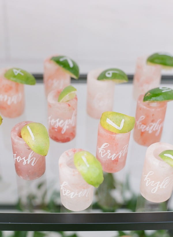 Pink Himalayan salt shot glasses as escort cards