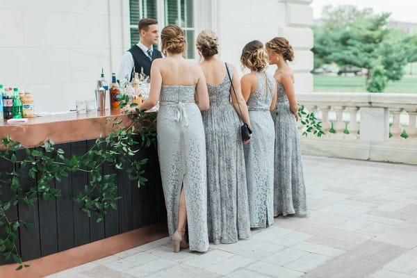 Bridesmaids at bar