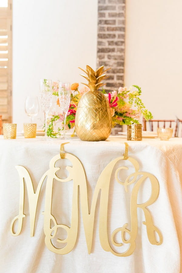 Gold pineapple on wedding table