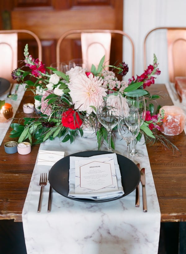 Wedding place setting with marble runner and menu