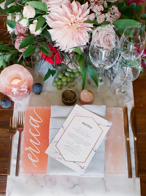 Wedding menu on top of personalised pink Himalayan salt slab