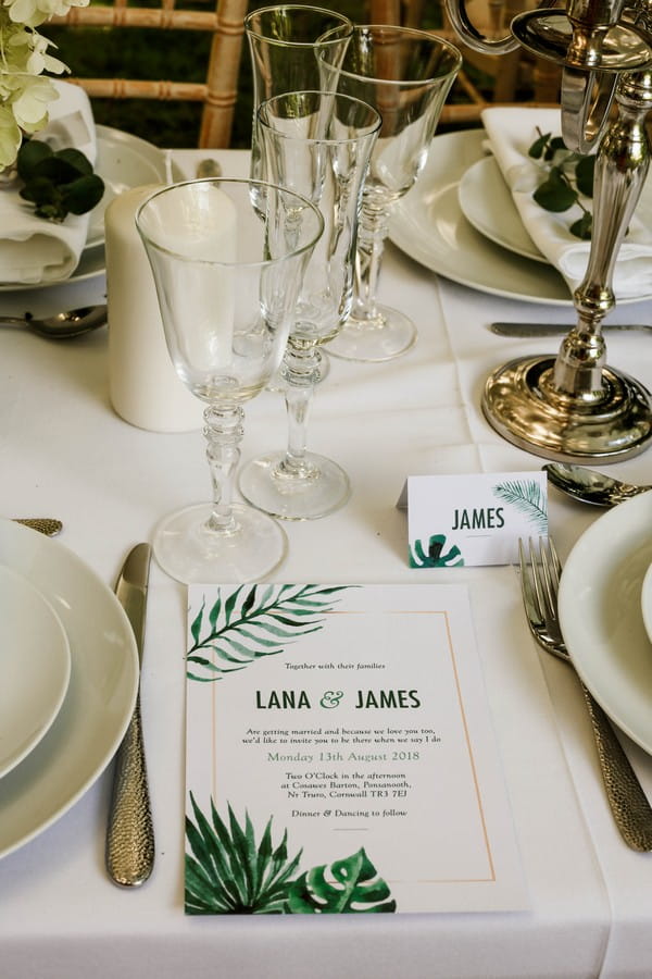 Wedding stationery with palm leaf design