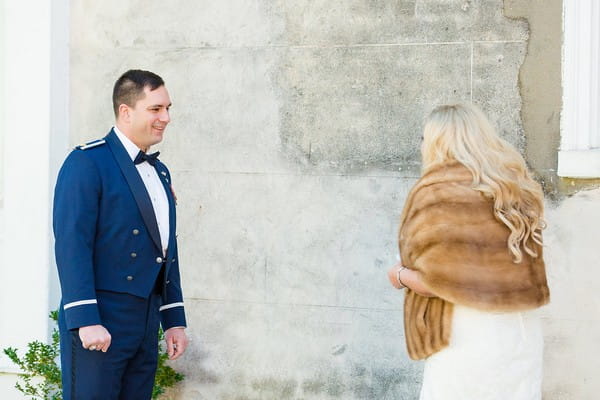 Groom turning to see bride for first look