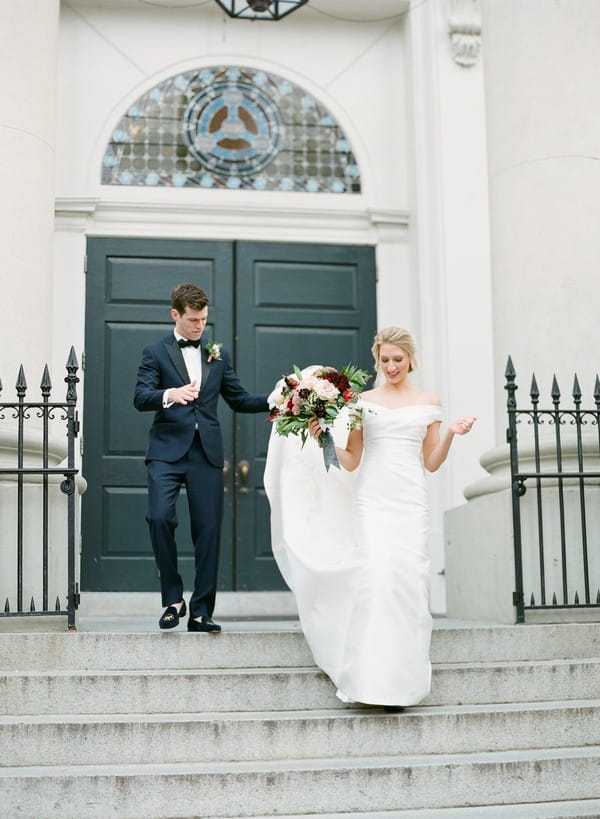 Bride and groom on steps