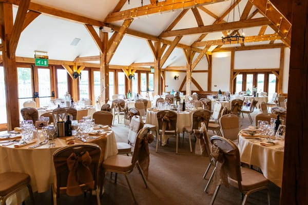 Wedding tables in Dining Barn at Sandhole Oak Barn