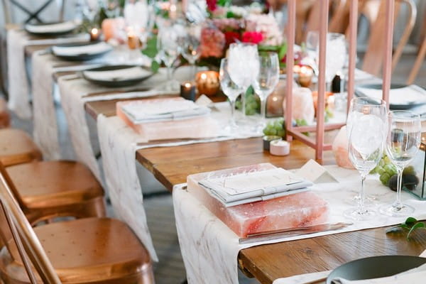 Wedding table with marble, copper and pink Himalayan salt styling