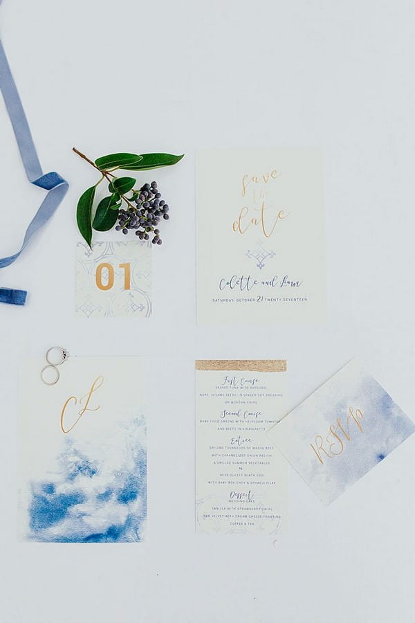 Wedding stationery with blue watercolour and copper detail