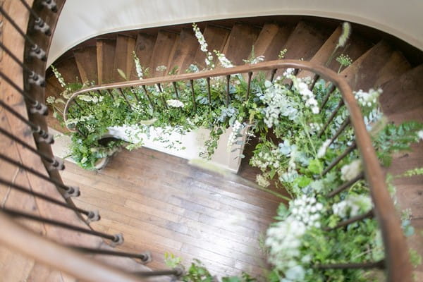 Staircase at Chateau de Redon decorated with foliage