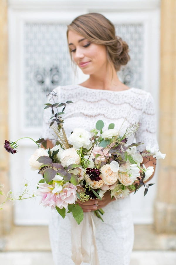 Bride holding natural, organic wedding bouquet