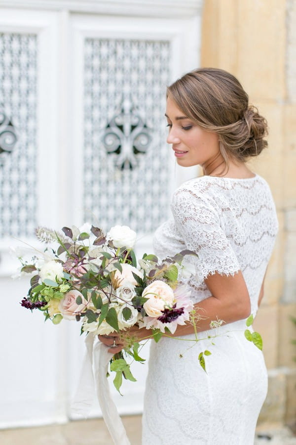 Bride holding natural bridal bouquet