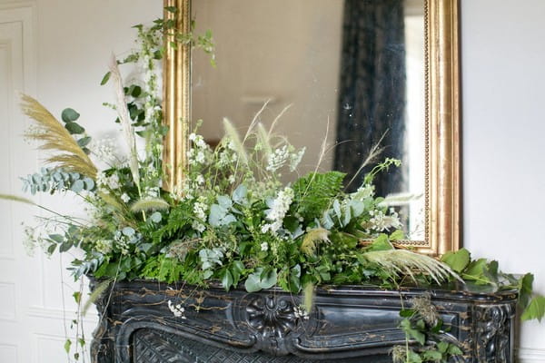 Mantelpiece decorated in foliage