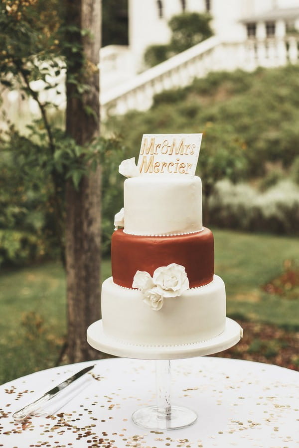 Ivory and copper wedding cake