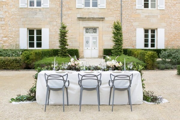 Modern grey Masters chairs at wedding table