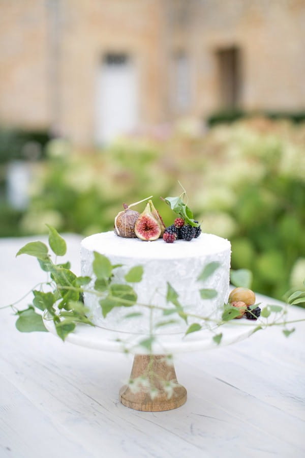 Wedding cake topped with fruit