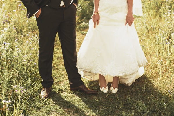 Bride and groom's legs