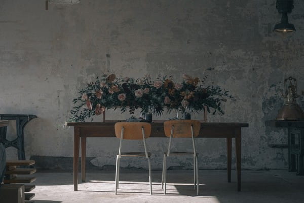 Wedding table with two chairs in warehouse