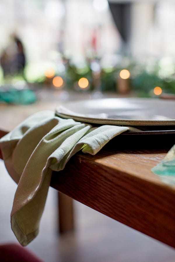 Grey wedding plate on green napkin