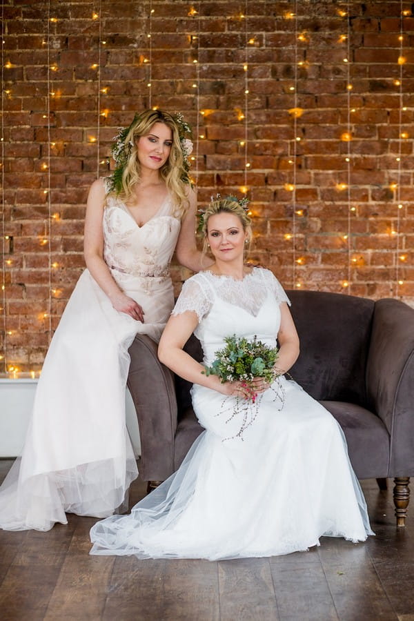 Two brides sitting on chair