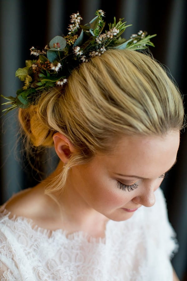 Bride with updo hairstyle with foliage in back