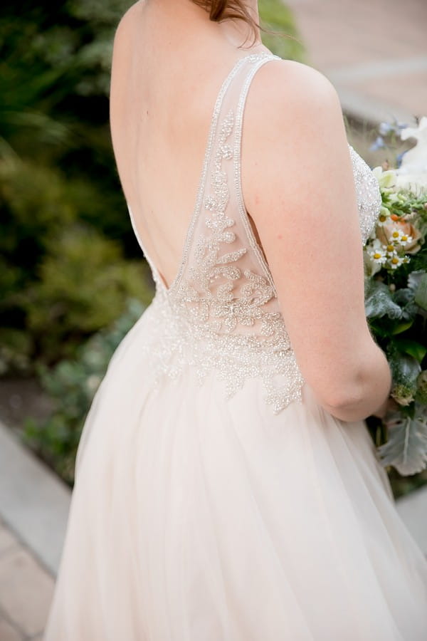 Detail on back of bride's wedding dress