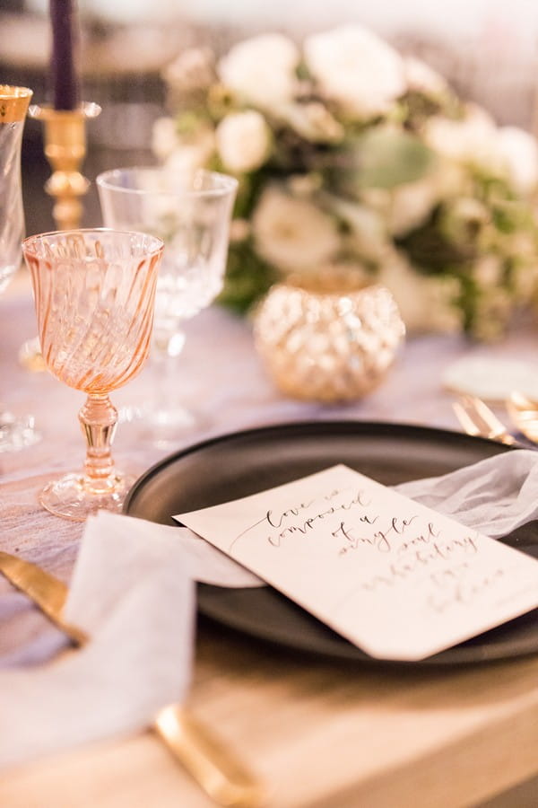 Wedding menu on black plate