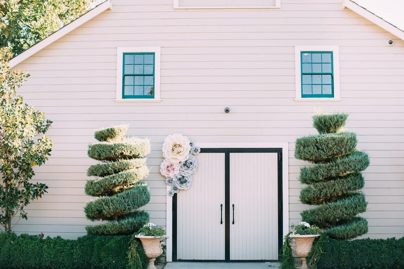 Large paper flowers on door at Scribner Bend Vineyards