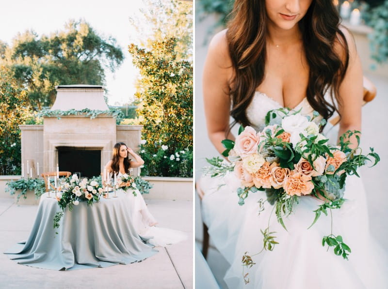 Bride sitting at wedding table holding bouquet