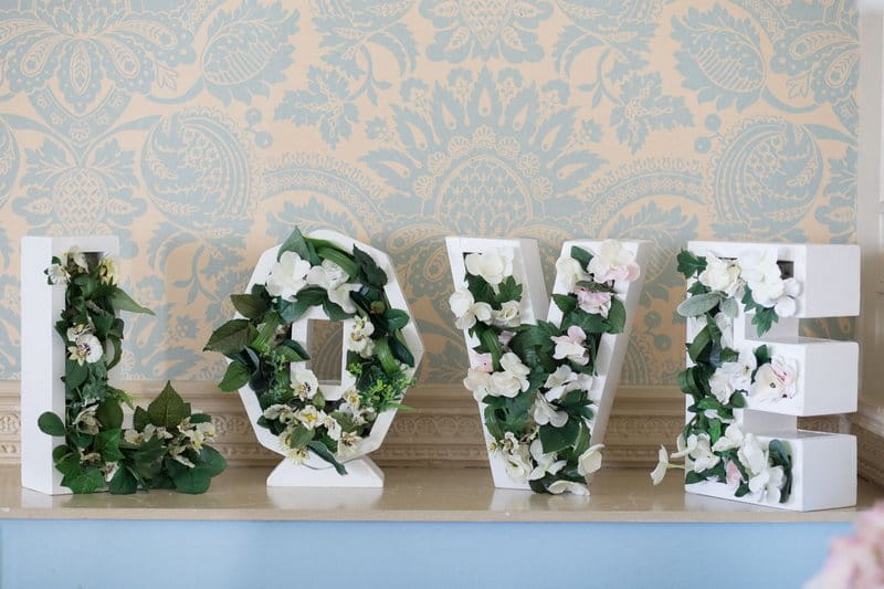 LOVE letters with greenery inside