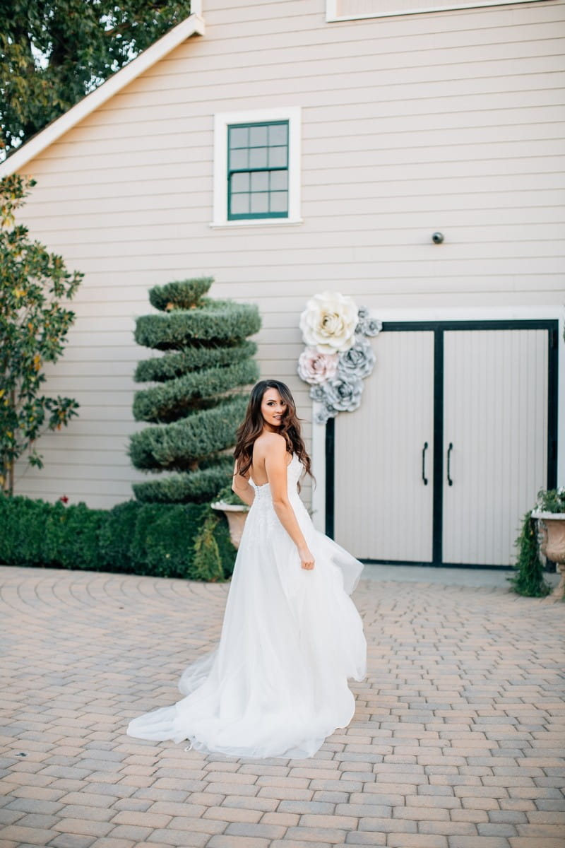 Bride in grounds of Scribner Bend Vineyards