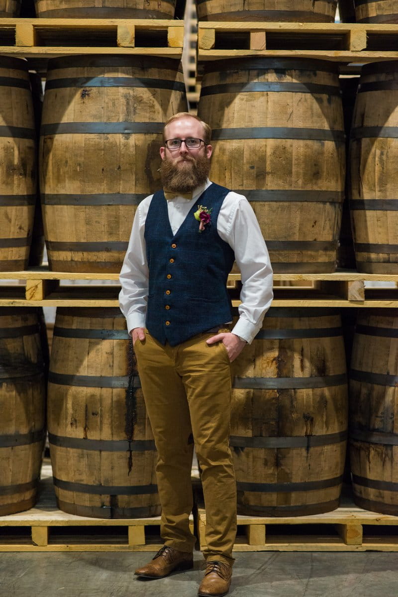 Groom in blue waistcoat and mustard chinos