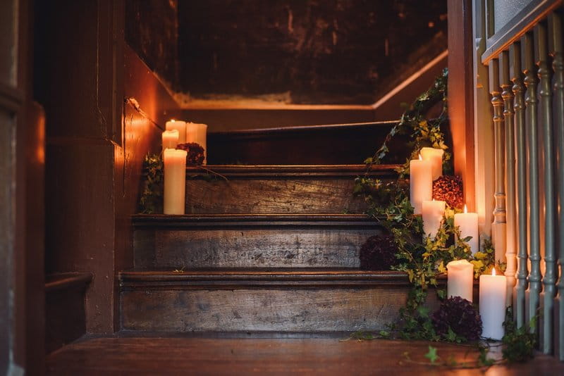 Candles and ivy on stairs