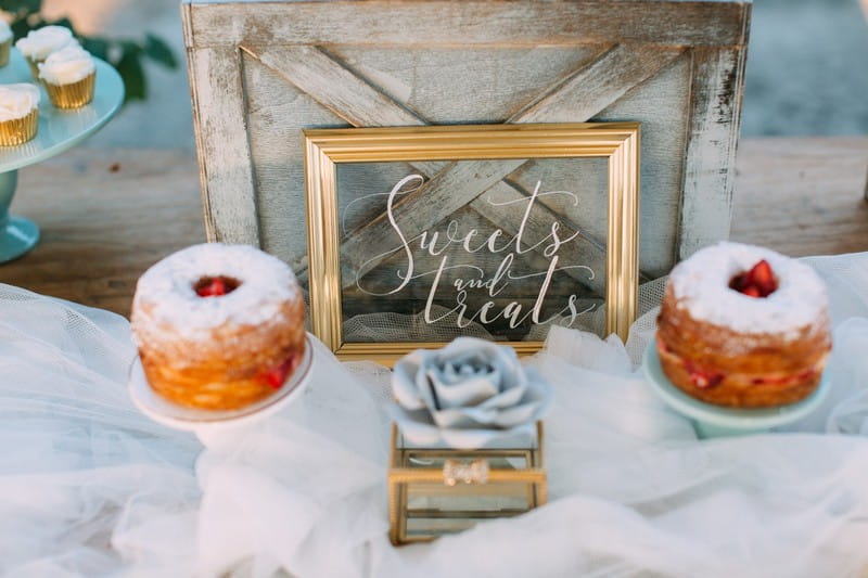 Sweet treats sign on wedding dessert table