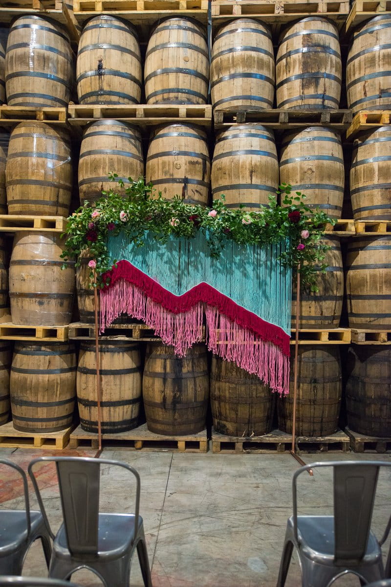 Coloured tassel wedding ceremony backdrop