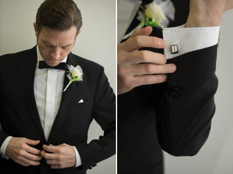 Groom putting on suit jacket