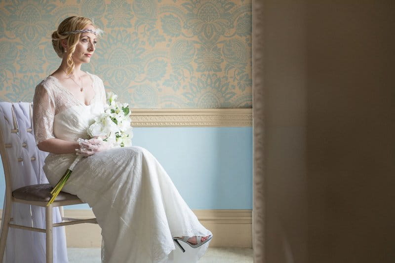 Vintage bride sitting in chair