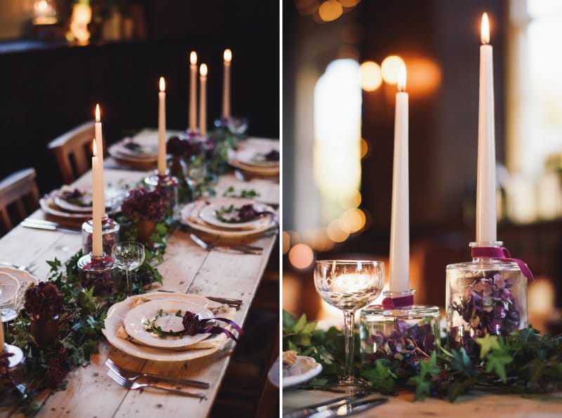 Cosy, rustic wedding table with candles, ivy runner and white plates