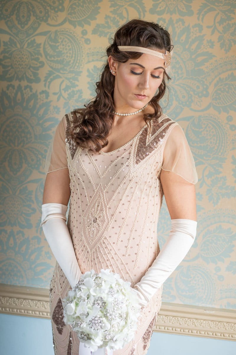 Bridesmaid wearing vintage style headband and long gloves