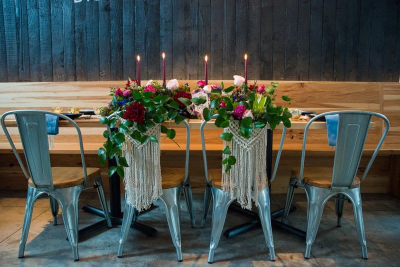 Wedding chairs with macramé hanging from back