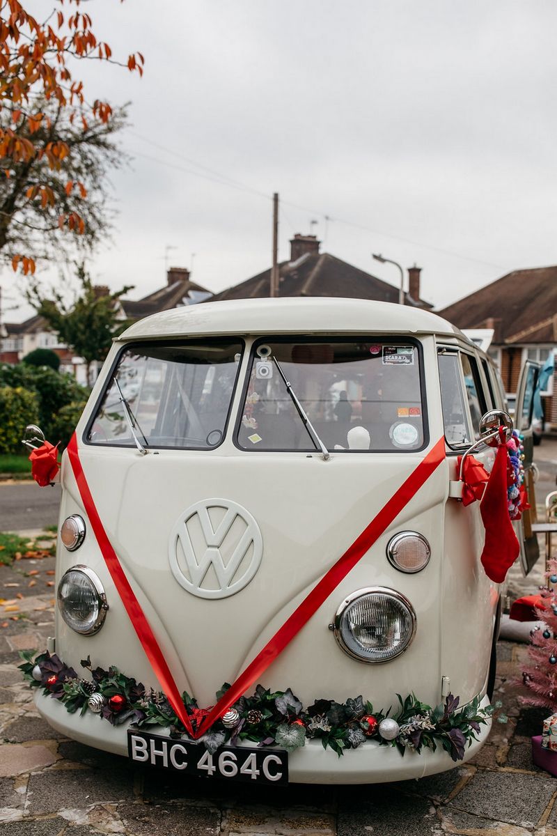 VW van with red ribbon on front