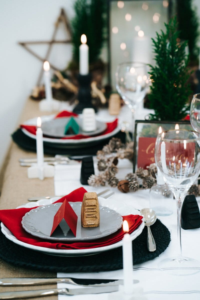 Winter wedding table styling in red, black and gold